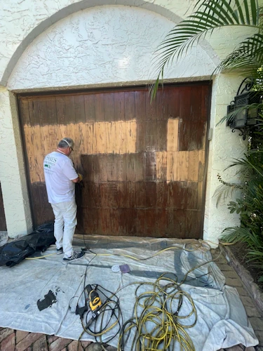 painting contractor Palm Beach before and after photo garage-door-staining-before